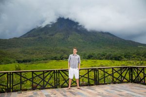 Groom overlooking the Arenal Volcano at the Mirador y Senderos Volcan Arenal 1968 Trail.