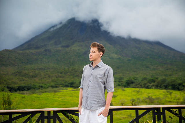 Groom overlooking the Arenal Volcano at the Mirador y Senderos Volcan Arenal 1968 Trail.