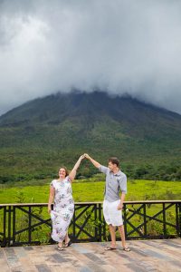 Newlyweds photos dancing in front of Arenal Volcano in La Fortuna, Costa Rica.