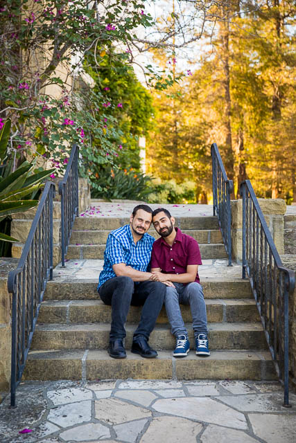 Husbands embracing at the Santa Barbara Courthouse.