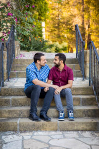 Husbands embracing at the Santa Barbara Courthouse.